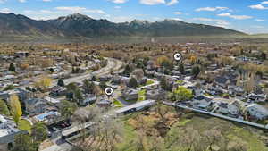 View of property location featuring nearby suburban area and a mountain backdrop