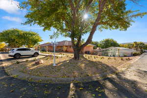 Single story home with glass enclosure