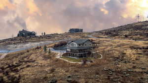 Rear view of property featuring a porch