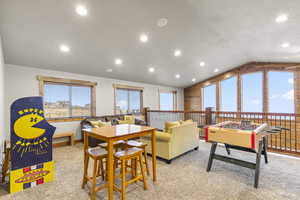 Game room with carpet floors, lofted ceiling, and recessed lighting