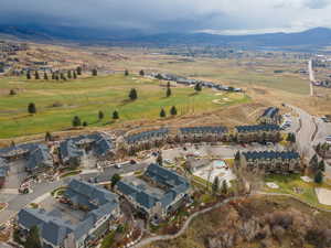 View of property location with a mountainous background and nearby suburban area