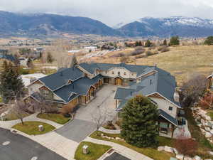 Aerial perspective of suburban area featuring a mountainous background