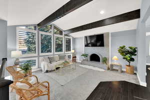 Living room featuring a fireplace and wood finish floors