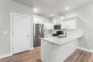 Kitchen with stainless steel appliances and Pantry