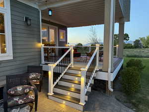 Entrance to property featuring a deck