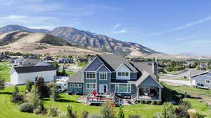 View of mountain background featuring nearby suburban area