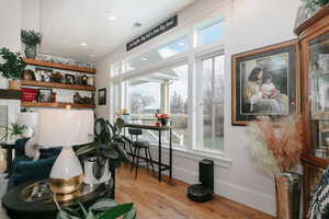 Interior space with light wood finished floors and baseboards