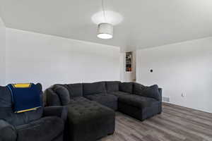 Living area featuring wood finished floors