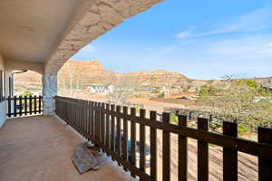 Balcony featuring a mountain view and a residential view