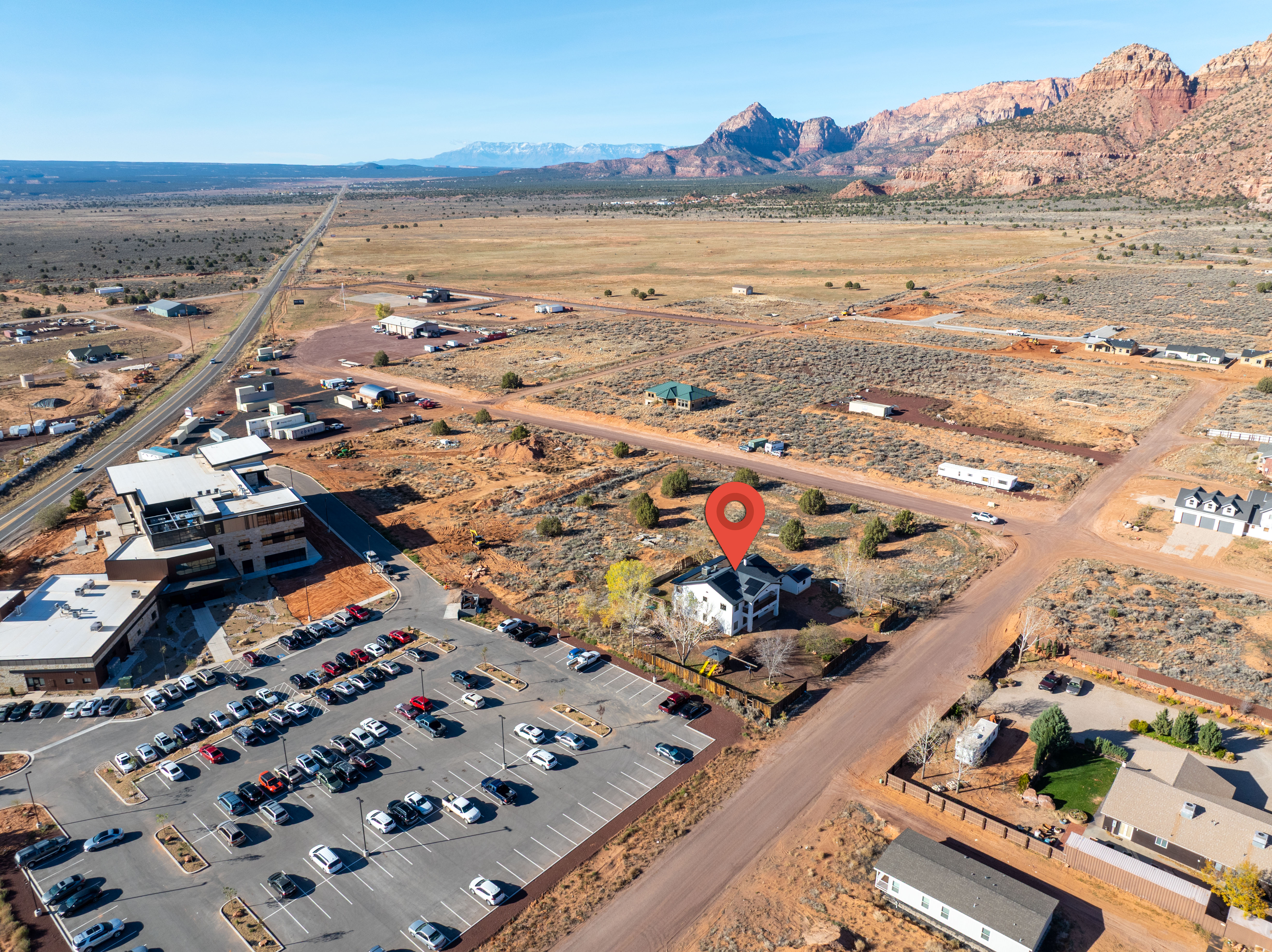Aerial overview of property's location with mountains