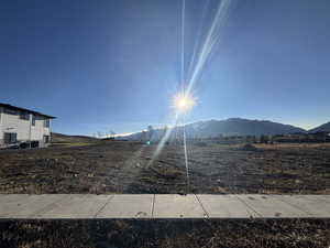 View of yard with a mountain view
