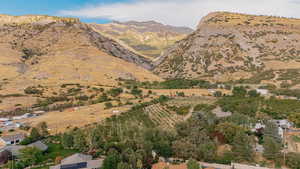View of mountain background featuring rural landscape