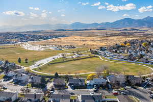 Aerial view of residential area with a mountainous background