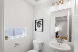 Bathroom with a sink and toilet