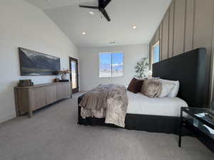 Bedroom featuring light carpet, vaulted ceiling, a ceiling fan, and recessed lighting