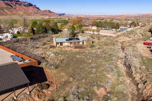 Aerial overview of property's location with mountains