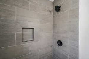 1597 - Bathroom view of a tile shower