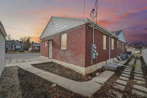 View of home's exterior featuring brick siding