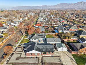 Aerial view of residential area with a mountainous background
