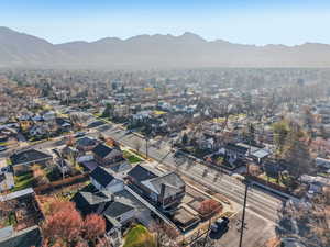 Aerial view of residential area featuring a mountainous background