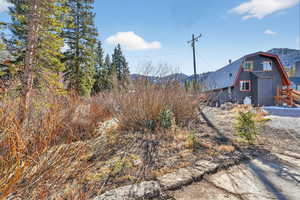 View of yard with a mountain view