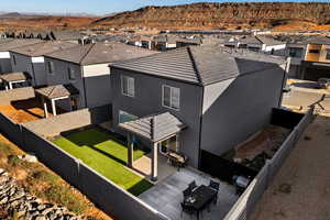 Aerial view of residential area with a mountain backdrop