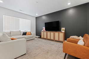 Living area featuring recessed lighting