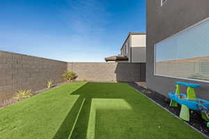 View of fenced backyard