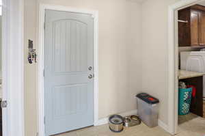 Entryway featuring baseboards