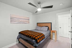 Bedroom with carpet and ceiling fan