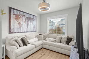 Living area with wood finished floors