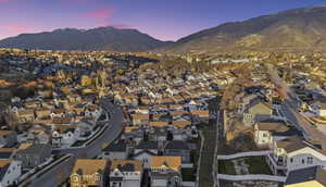 Aerial view at dusk of a residential view and a mountain view