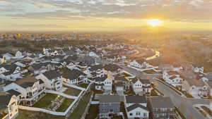 Aerial view of residential area featuring a mountain backdrop