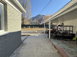 View of patio featuring a mountain view