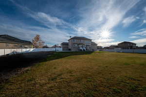 View of fenced backyard
