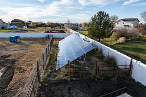 Aerial view of residential area and solar panels