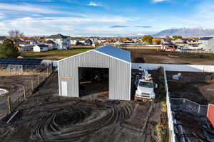 Detached garage/workshop. 14' door included.