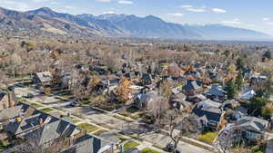 Aerial view of property's location featuring mountains