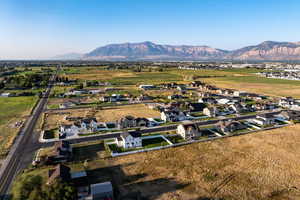 Aerial view of residential area with a mountain backdrop