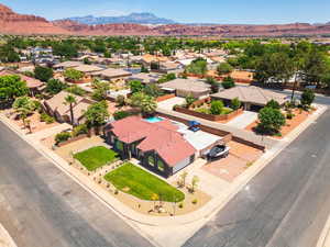 Aerial view of residential area featuring mountains