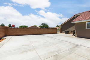 Fenced backyard featuring a patio area