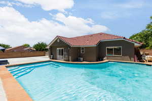 View of pool with a patio area