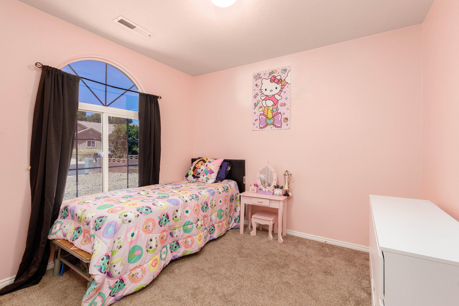 Bedroom featuring light colored carpet and baseboards