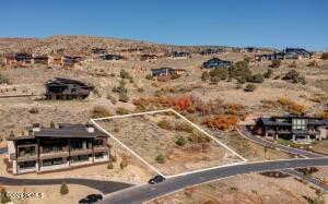 View of rural area featuring a desert landscape and property parcel outlined