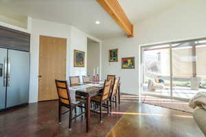 Dining area with concrete floors and recessed lighting
