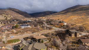 Mountain view featuring nearby suburban area