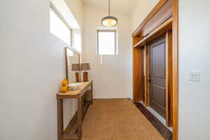 Hall with lofted ceiling