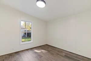 Unfurnished room featuring wood finished floors