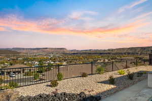 Yard at dusk with a mountain view