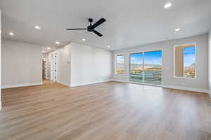 Unfurnished room with recessed lighting, light wood-style flooring, and a ceiling fan